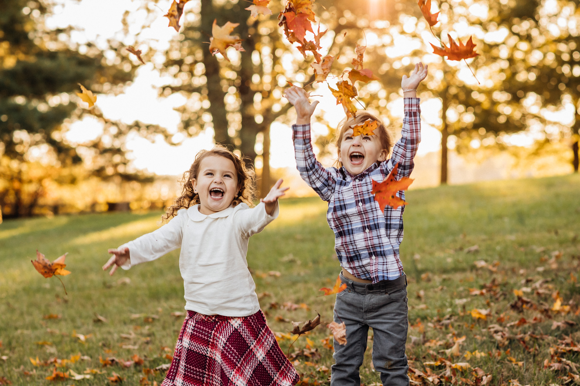 Kids Throwing leaves in the air